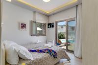 Posteľ alebo postele v izbe v ubytovaní Superior Villa Marina Mare Sauna Hammam