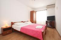 Postel nebo postele na pokoji v ubytování Apartments Beslema