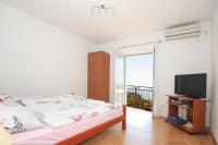 Postel nebo postele na pokoji v ubytování Apartments Beslema