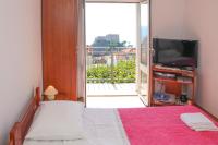 Postel nebo postele na pokoji v ubytování Apartments Beslema