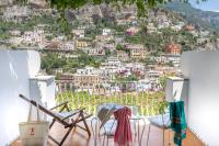 a view of positano from the balcony of a house at Hotel Poseidon in Positano