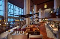 Um restaurante ou outro lugar para comer em Hyatt Regency Qingdao