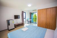 Promsook Apartmentにあるベッド
