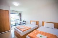 Promsook Apartmentにあるベッド