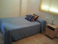 Posteľ alebo postele v izbe v ubytovaní Hostal Arneva Orihuela