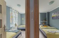 Posteľ alebo postele v izbe v ubytovaní Apartament Grosik