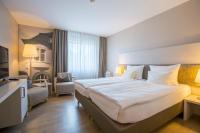 Postel nebo postele na pokoji v ubytování Best Western Plus Theodor Storm Hotel