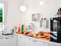 A kitchen or kitchenette at Farosardo