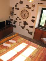 A bed or beds in a room at New Arcobaleno Ossegna