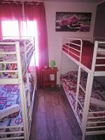 A bed or beds in a room at nada