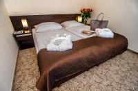 Posteľ alebo postele v izbe v ubytovaní Hotel Emocja SPA