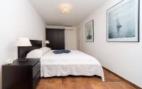 Ein Bett oder Betten in einem Zimmer der Unterkunft I Sassi Bianchi - East Villa
