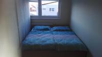 Postel nebo postele na pokoji v ubytování Apartman Jarosova