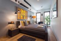 Posteľ alebo postele v izbe v ubytovaní InPoint Central Suites with Parking Available