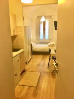 A bed or beds in a room at Appartamento Maggiore