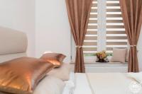 Łóżko lub łóżka w pokoju w obiekcie Grace Apartment I