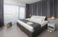 Ein Bett oder Betten in einem Zimmer der Unterkunft Hotel Astral Nirvana Club- Half Board