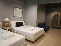 Postel nebo postele na pokoji v ubytování Loft 21 Apartment Romklao