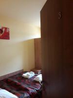 Łóżko lub łóżka w pokoju w obiekcie Hotel Paola