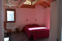 Cama ou camas em um quarto em Chalet D&#39; Edmond