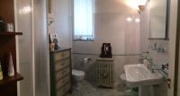A bathroom at In Via Roma
