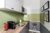 Kuchnia lub aneks kuchenny w obiekcie Sanhaus Apartments - CHOPINA 13 - apartamenty w centrum, 5 minut od plaży i deptaka