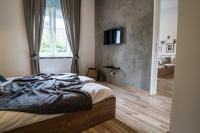 Posteľ alebo postele v izbe v ubytovaní Apartments Industrial Nordic Zagreb