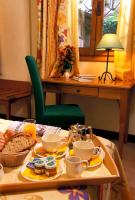 a table with a tray of food on top of it at Hotel Santa Maria in Rome