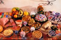 a table topped with lots of different types of food at Hotel Santa Maria in Rome