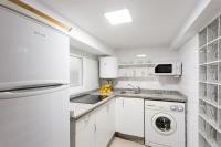 A kitchen or kitchenette at Apartamentos Diaber Gerona 22