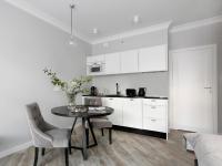 Kuchyňa alebo kuchynka v ubytovaní Lavoo Boutique Apartments