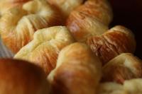 a pile of croissants sitting next to each other at Long Life Riverside Hotel in Hoi An