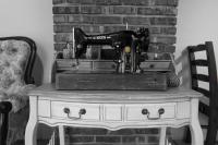 a sewing machine sitting on top of a dresser at Brulee&#39;s Done in Dongshan