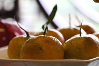 a bunch of apples sitting in a bowl at Long Life Riverside Hotel in Hoi An
