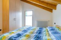 A bed or beds in a room at Apartment Valdisole
