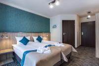 Posteľ alebo postele v izbe v ubytovaní Krasicki Hotel Resort & Spa