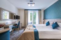 Posteľ alebo postele v izbe v ubytovaní Krasicki Hotel Resort & Spa