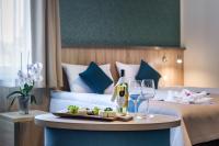 Posteľ alebo postele v izbe v ubytovaní Krasicki Hotel Resort & Spa