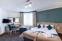 Televízia a/alebo spoločenská miestnosť v ubytovaní Krasicki Hotel Resort & Spa