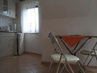 Kuchyňa alebo kuchynka v ubytovaní Akácfa Hortenzia Apartman