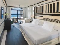 A bed or beds in a room at H10 Rubicón Horizons Collection