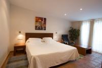 Posteľ alebo postele v izbe v ubytovaní Hotel Cal Naudi