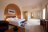 Posteľ alebo postele v izbe v ubytovaní Hotel Cal Naudi