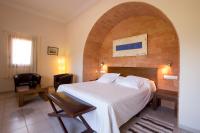 Posteľ alebo postele v izbe v ubytovaní Hotel Cal Naudi
