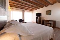 Posteľ alebo postele v izbe v ubytovaní Hotel Cal Naudi