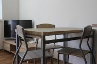 Televízia a/alebo spoločenská miestnosť v ubytovaní Villa Tatranit