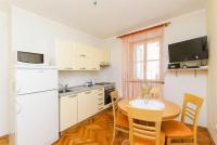 Kuchyňa alebo kuchynka v ubytovaní Apartment Kampanel