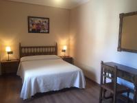 Posteľ alebo postele v izbe v ubytovaní Hostal Argentino