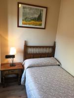 Posteľ alebo postele v izbe v ubytovaní Hostal Argentino