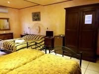Posteľ alebo postele v izbe v ubytovaní Hotel Villa Elisabetta